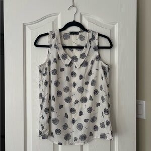 Elegant Floral Sleeveless Blouse - Black and White